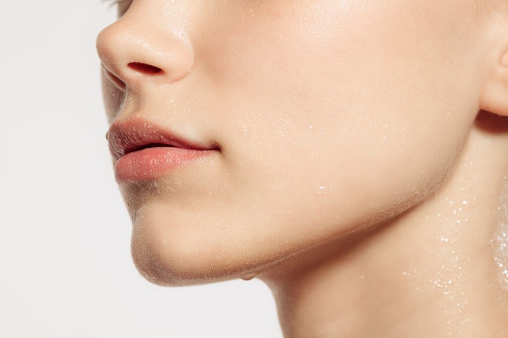 Face building.,Closeup,Female,Lips,,Cheeks,And,Nose,Isolated,Over,White